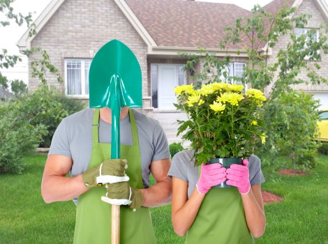 Contract worker handing over verified documents at a garden site